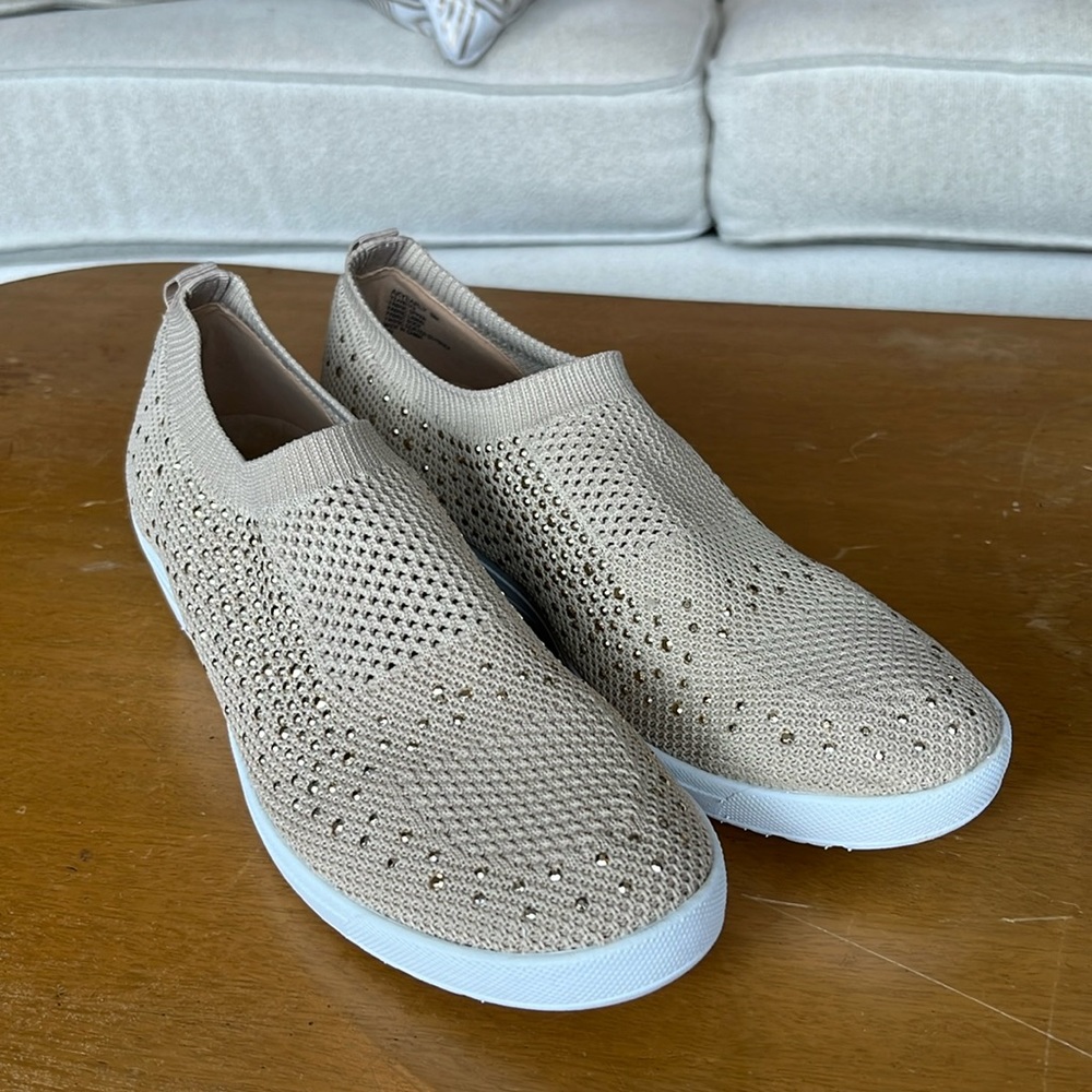 Anne Klein gold sparky stretchy tennis shoes.